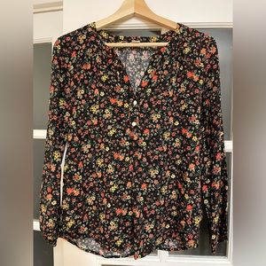 Old navy floral blouse - three buttons down front. Pet and smoke free home.